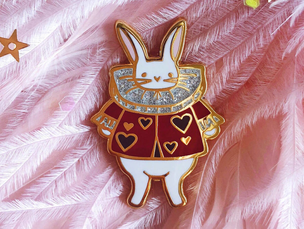 https://bonafidebookworm.com/wp-content/uploads/2019/11/alice-in-wonderland-white-rabbit-glitter-enamel-pin-1024x774.jpg