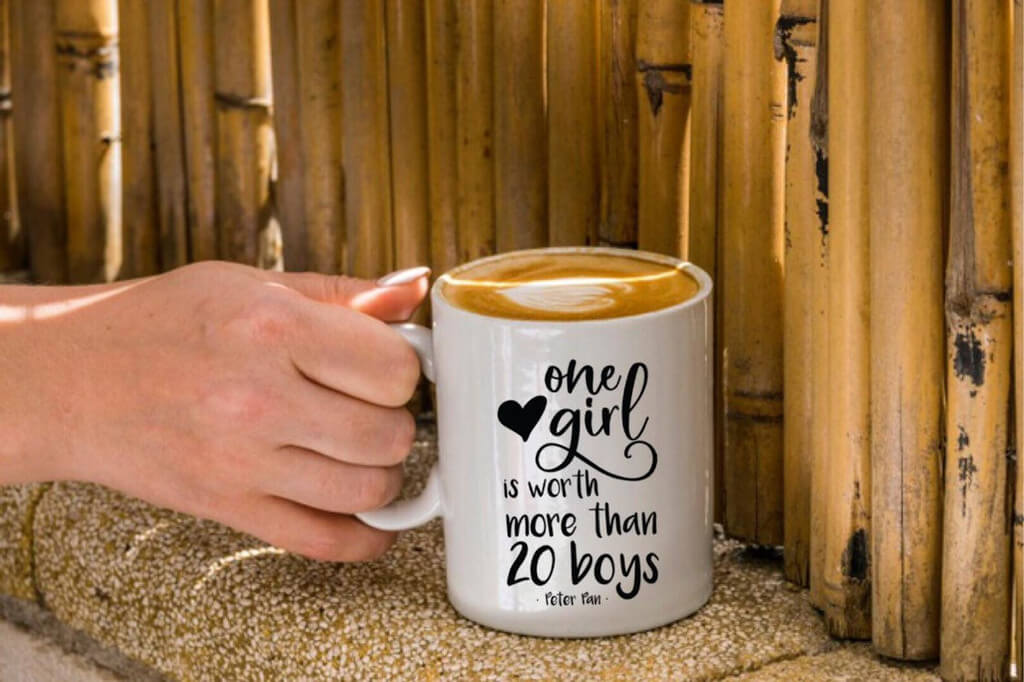 Mug that reads "One girl is worth more than 20 boys"