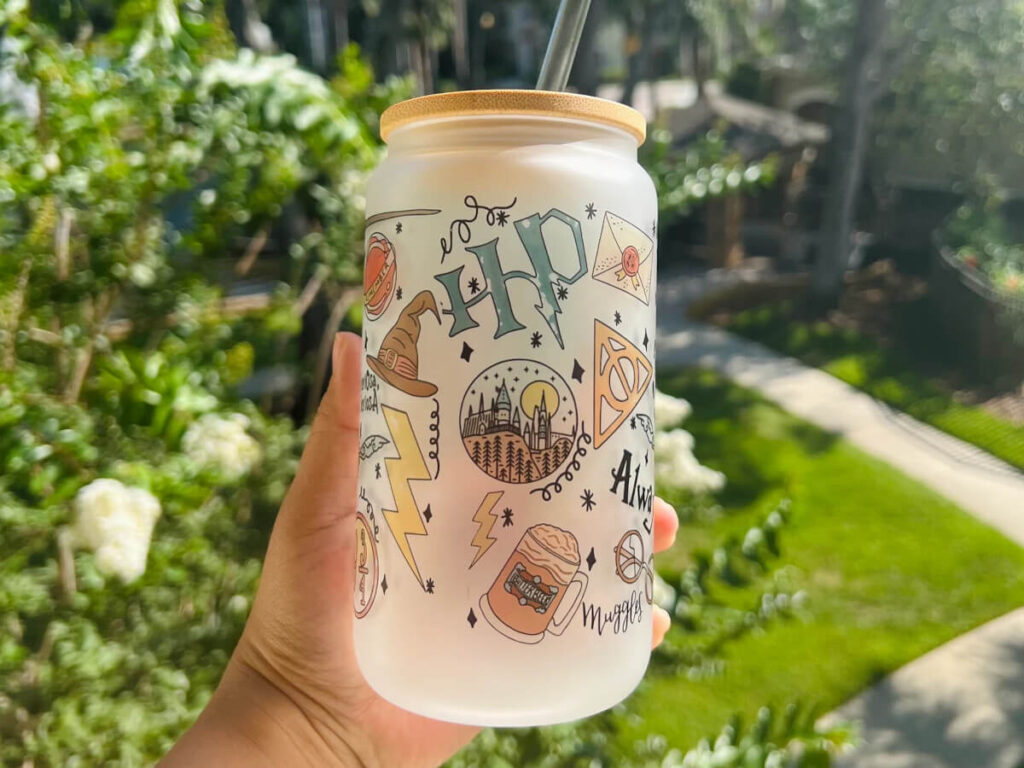 Frosted glass cup with Harry Potter themed decals by SapphiretheLabel