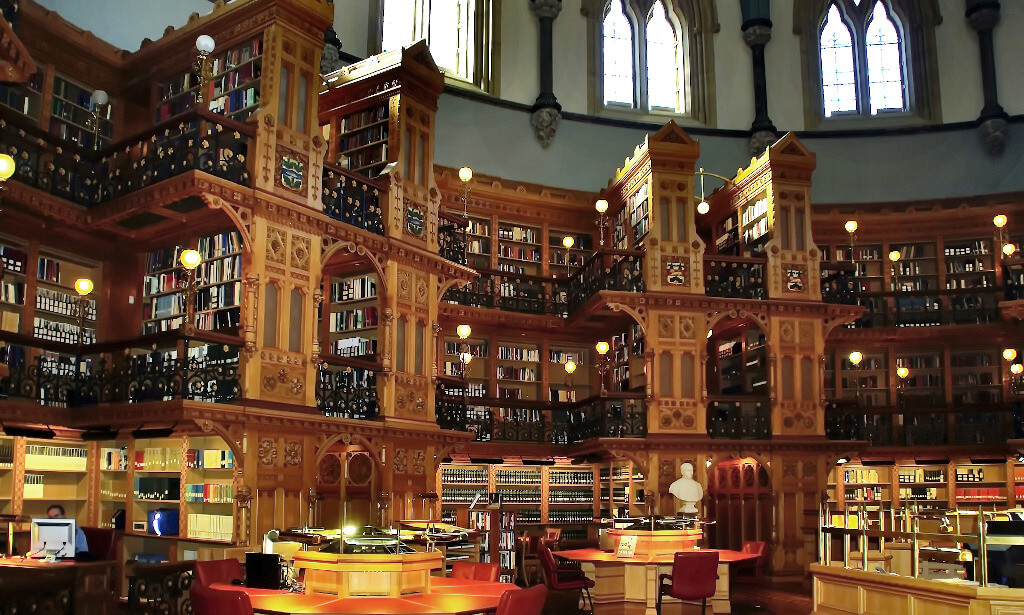 The round room of the Library of Parliament with towering bookshelves