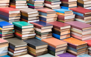 Books organized into neat piles