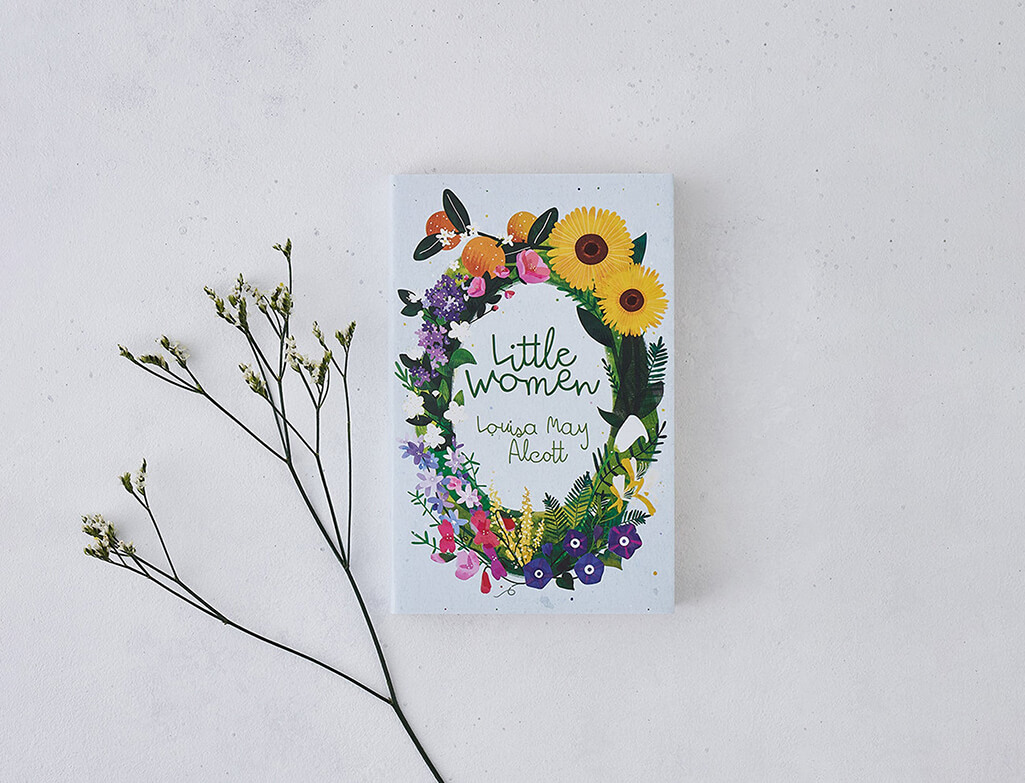 Book cover featuring flowers in a wreath and the text "Little Women Louisa May Alcott" by Bookishly UK