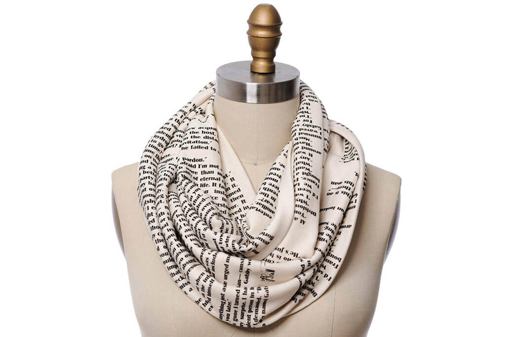 White scarf with black text from The Great Gatsby. By Storiarts