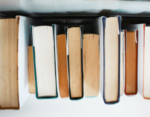 Row of books lined up, viewed from above
