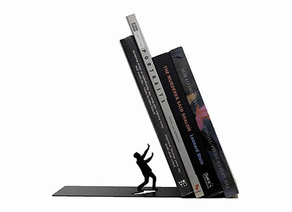 Bookend with a small figure with its hands up while the books resting on it seem to be falling. By ArtoriDesign