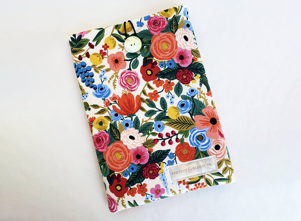 Floral patterned book sleeve by Feather and Bloom Co
