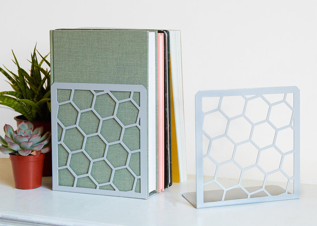 Metal bookends in honeycomb design by geomodus
