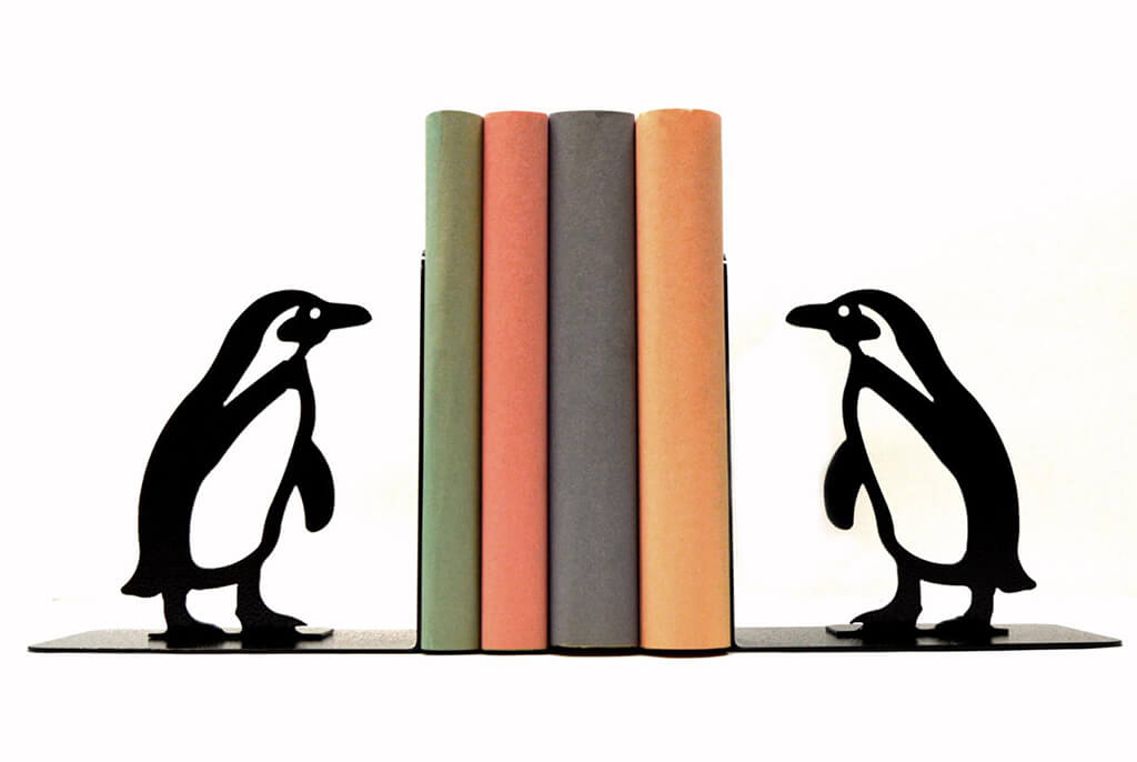Metal penguin-shaped bookends by KnobCreekMetalArts