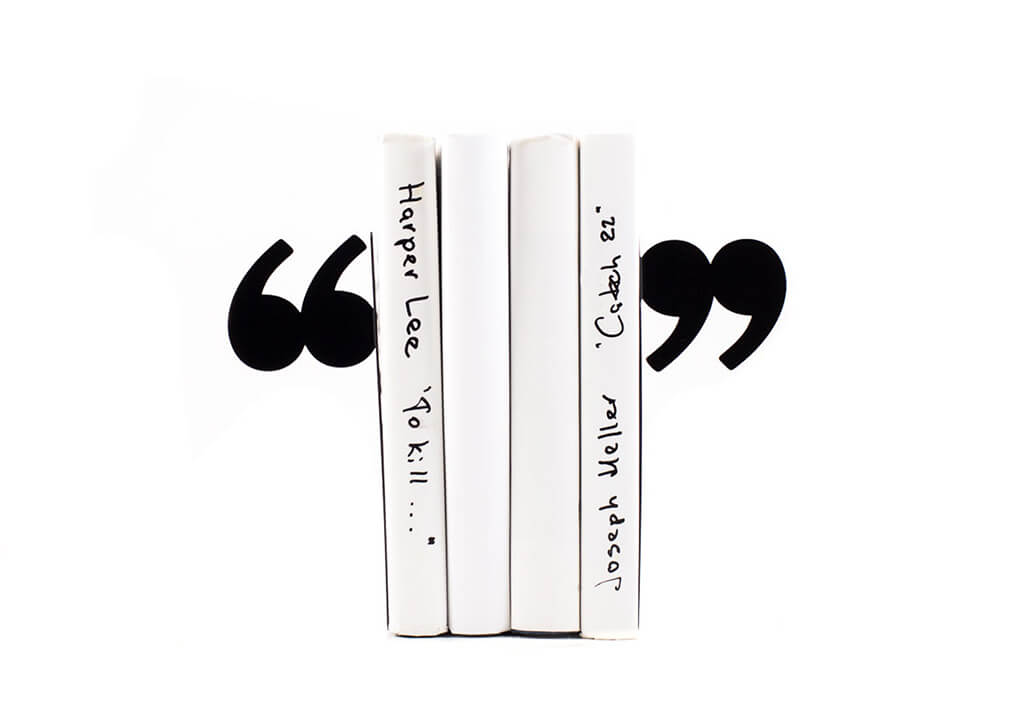 Black metal bookend shaped like quotation marks by DesignAtelierArticle