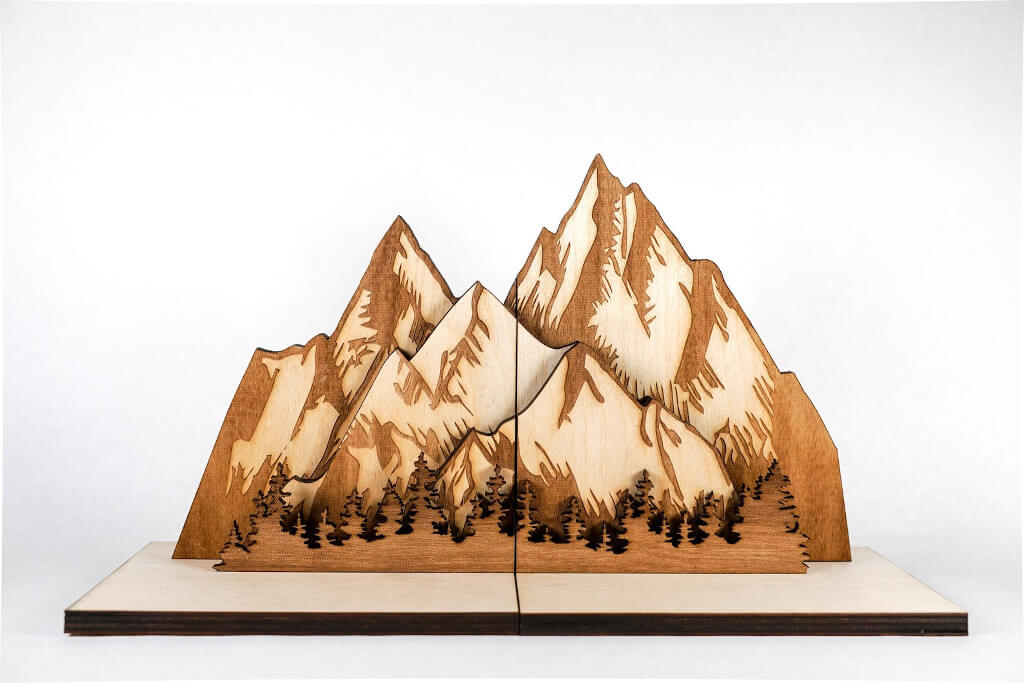Mountain-shaped bookends made out of wood by MokuShop