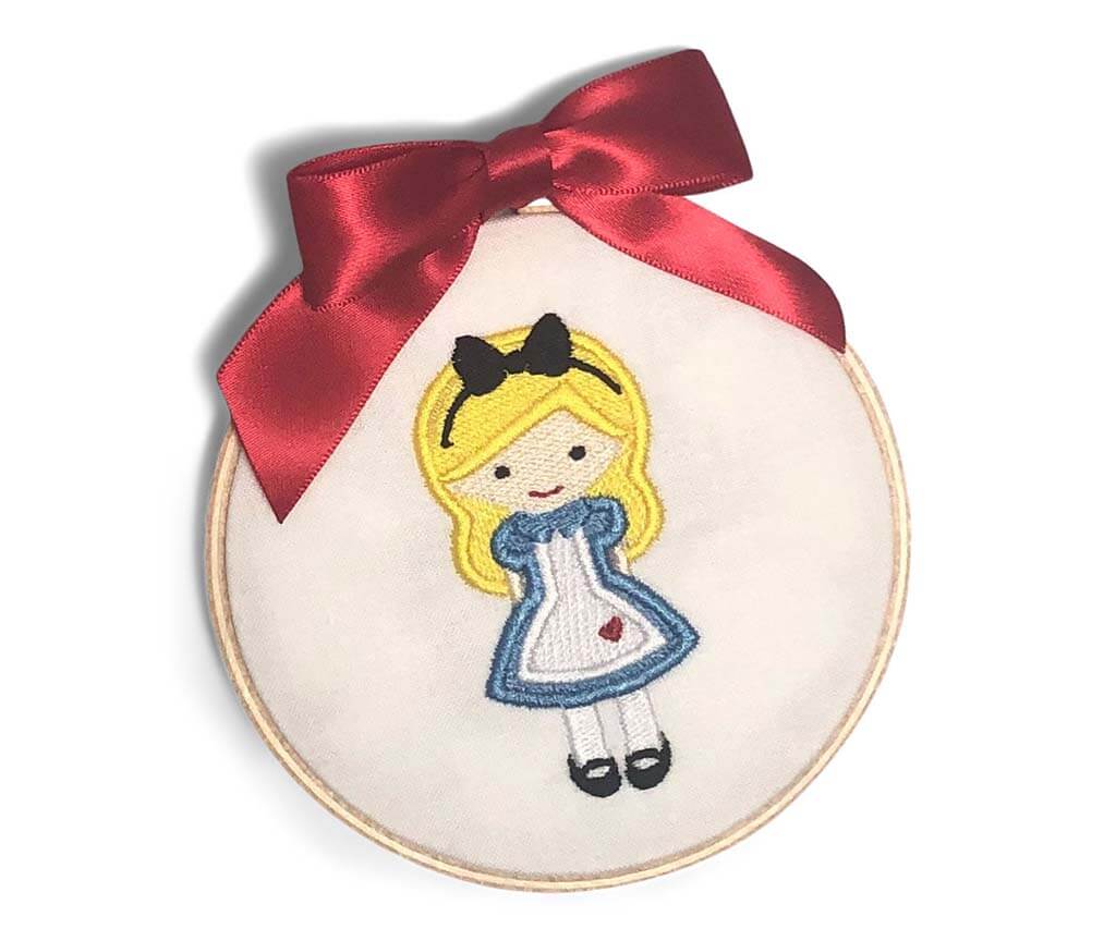 Embroidered Alice character on an embroidery hoop ornament by VibrantlyBlue
