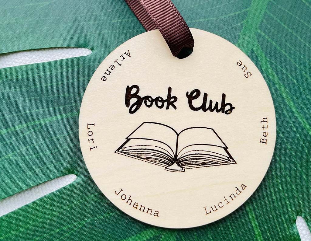 Round wooden book club ornament with open book image in middle by PersonalizedGiftsND