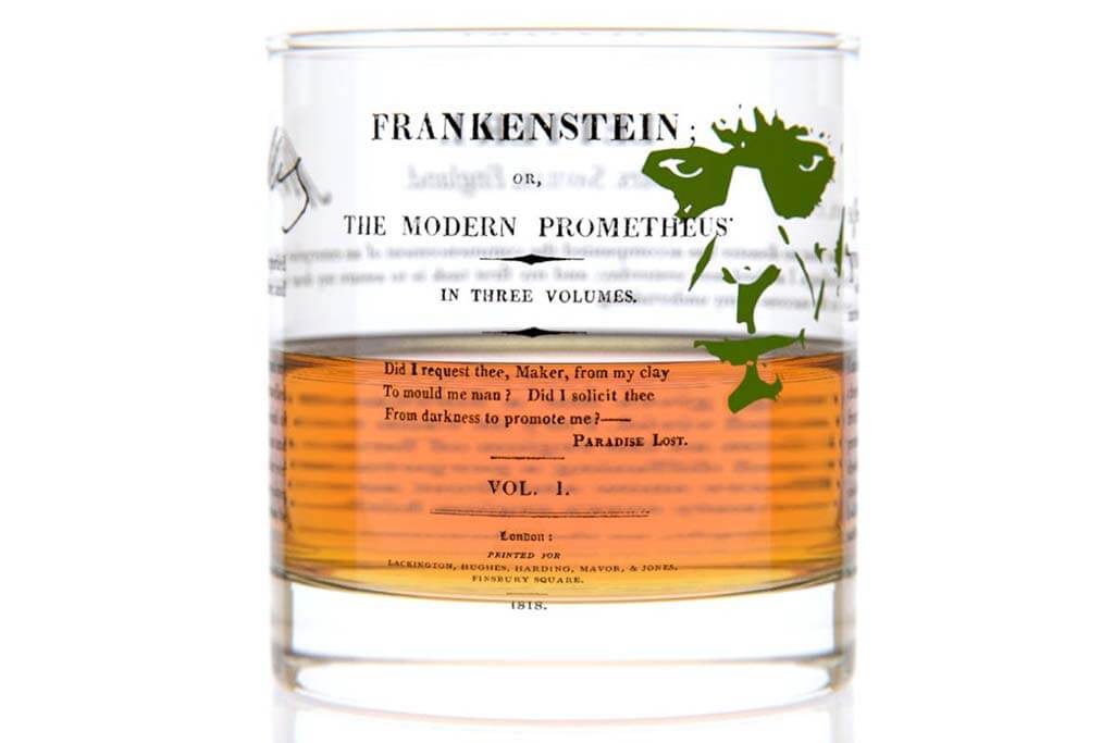 Clear whiskey glass with text from Frankenstein printed on it. By WellTold.