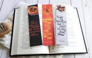 Black, red, and white bookmarks with Hunger Games quotes by RockPaperWords