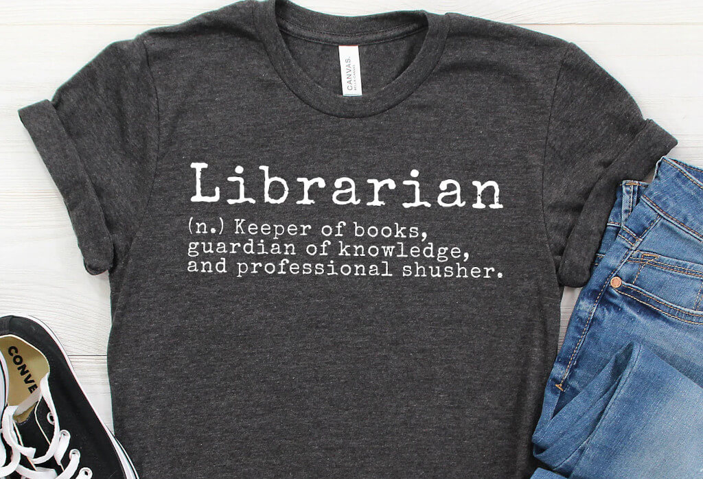 Gray shirt with text that reads "librarian" and defines what it means by WichitaClothing