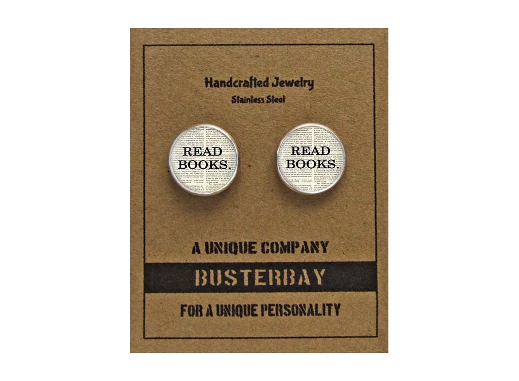 Round stud earrings with book page backround and the words "read books" on each. By BusterBay