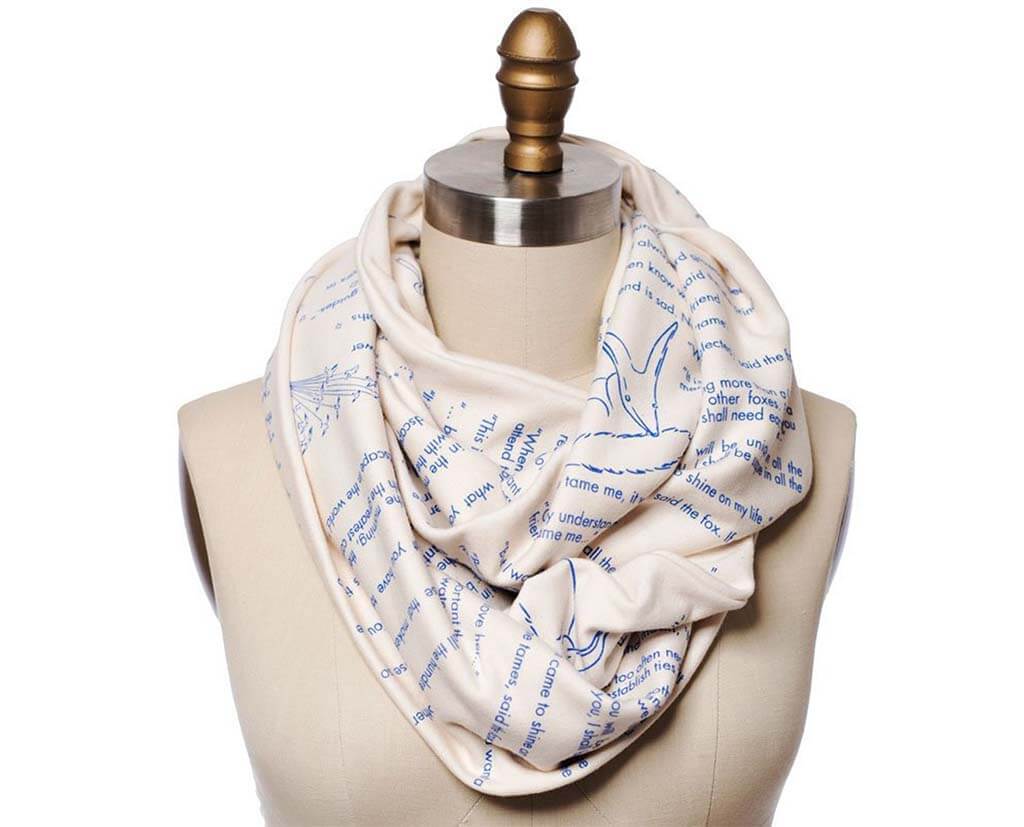 White scarf with blue text from The Little Prince by storiarts