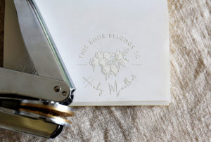 Book embosser design with "This book belongs to [Your Name]" and the design of a bee and honeycomb inside by SusanCraftsShop