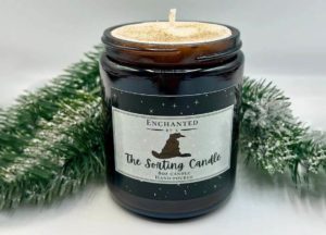 Candle that reads "The Sorting Candle" by EnchantedbyK