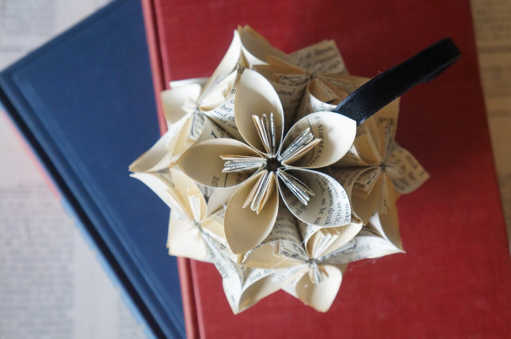 Geometric flower-like bauble Christmas ornament by BookologyCo