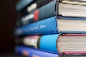 Spines of new books in a book stack